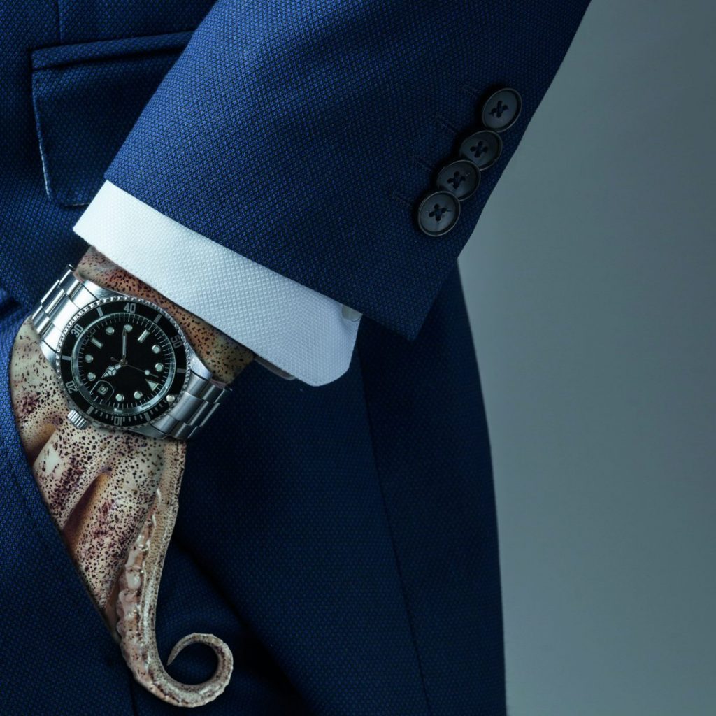 hand,in,pocket,with,wrist,watch,in,a,business,suit